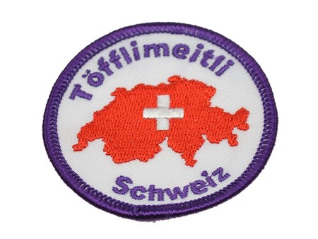 Ecusson Töfflimeitli textile, a coller au fer à repassser ou a coudre. Ecusson Töfflimeitli textile, a coller au fer à repassser ou a coudre.